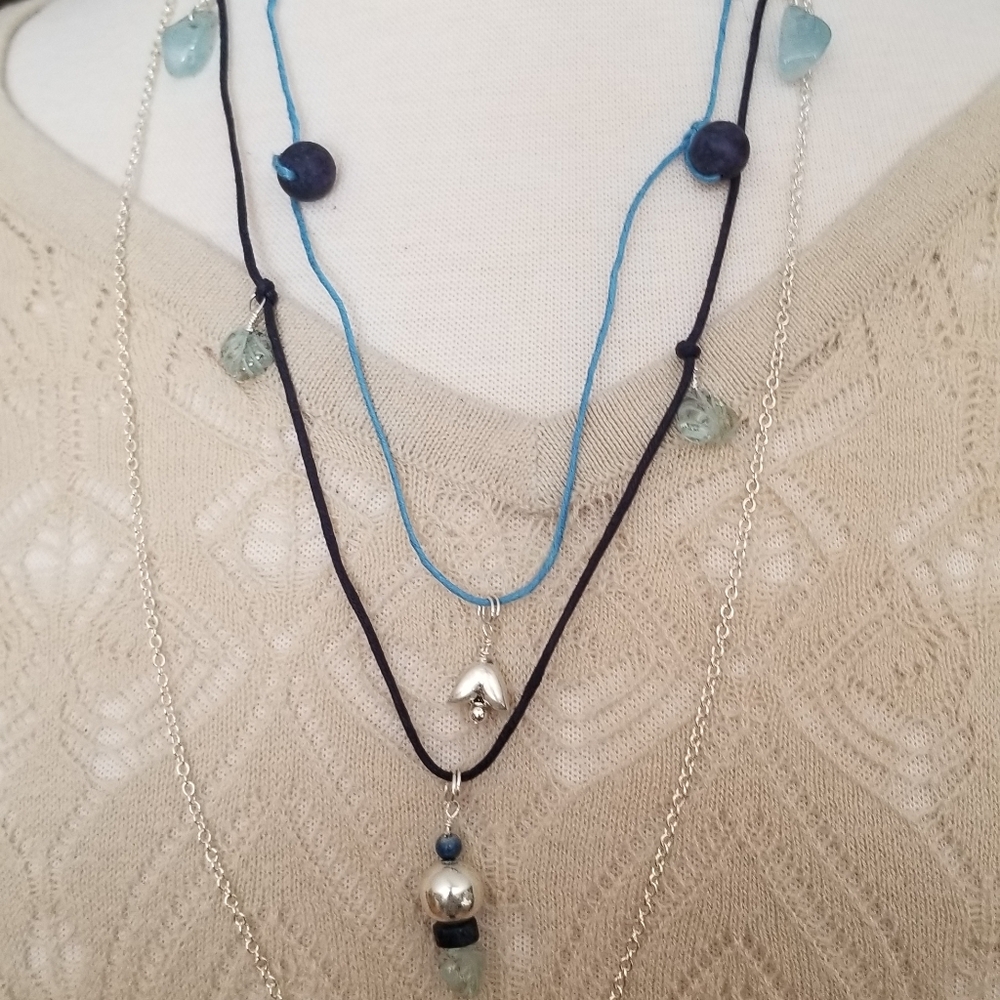 Silver and silk cord necklace with aquamarine